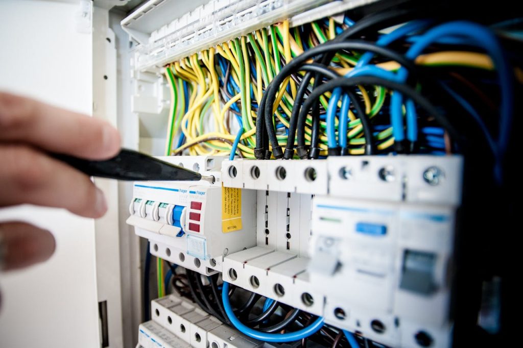 Electrician Fixing An Opened Switchboard 257736 1024x682